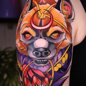 Nahaufnahme eines farbigen Oberarm-Tattoos mit Fuchsmotiv von Luiz Lacorte, umgesetzt im Electric Eel Tattoo Studio in Köln-Ehrenfeld.